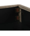 Corner of a dark room with wooden trim