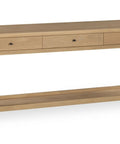 Wooden console table with three drawers on a white background