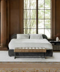 Modern bedroom with a bed, nightstands, and large windows.